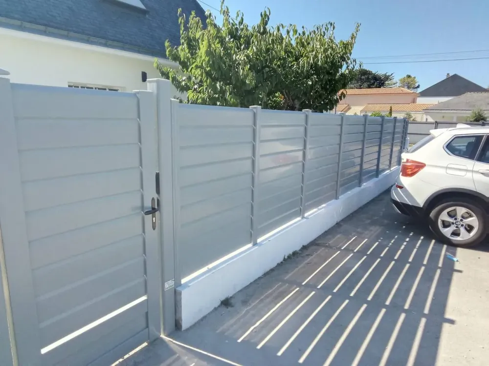 Clôture lames persiennees en PVC